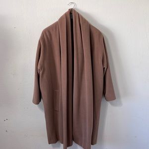 Oversized wool coat with dramatic collar detail